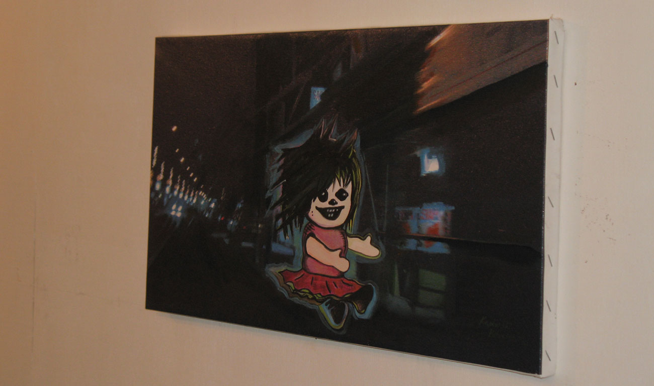 image of canvas presenting puppet drawing placed on the photo of some street 